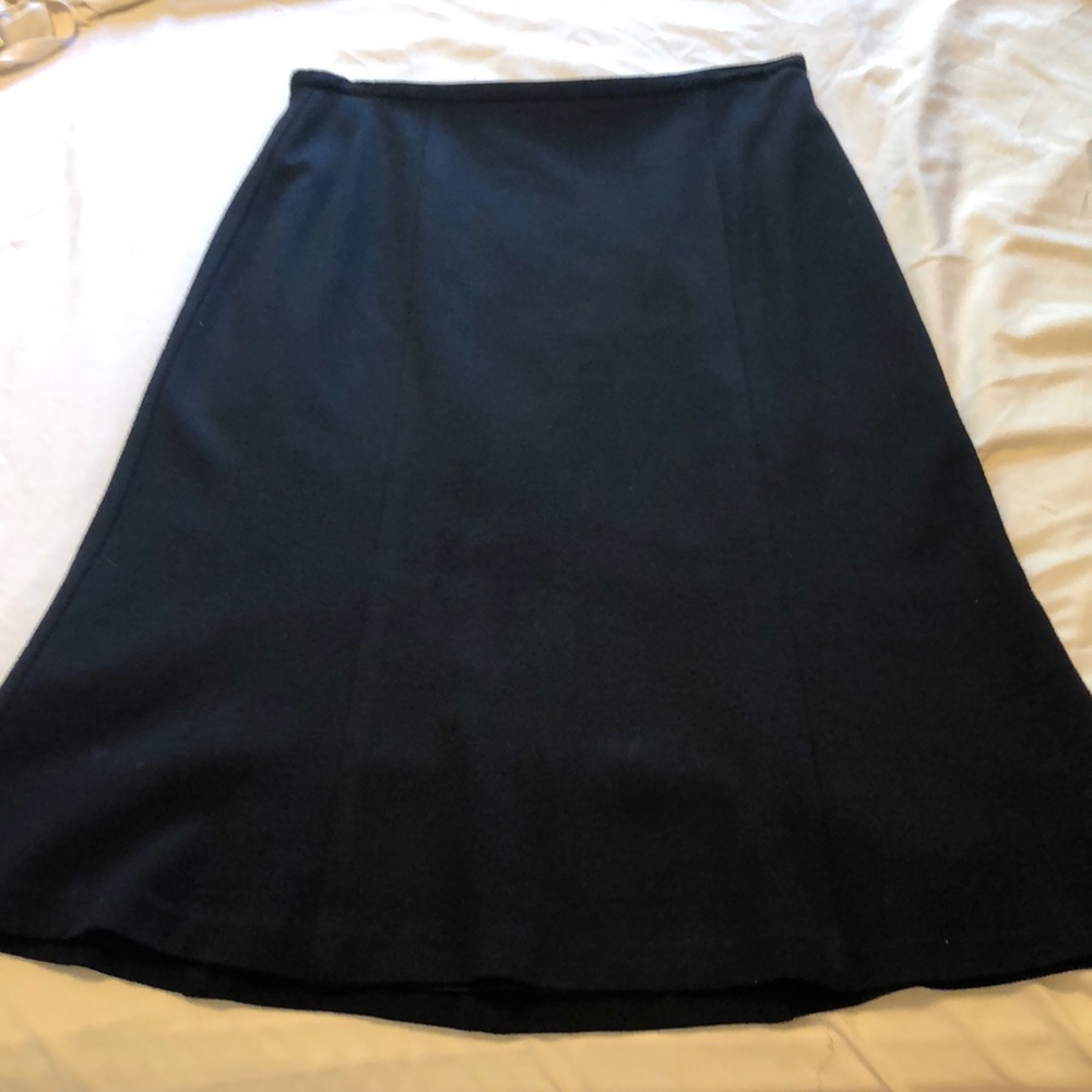 Harold’s black skirt
